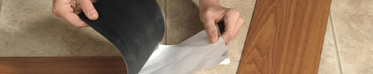 A professional installing vinyl flooring in Sioux Falls, SD